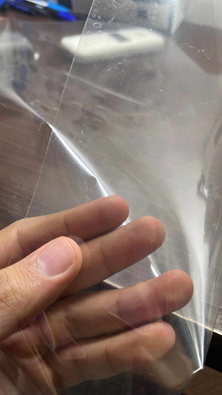 45 microns +/- self adhesive transparent laminating film with polyster release.