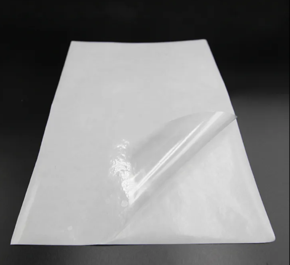 45 microns +/- self adhesive transparent laminating film with paper release