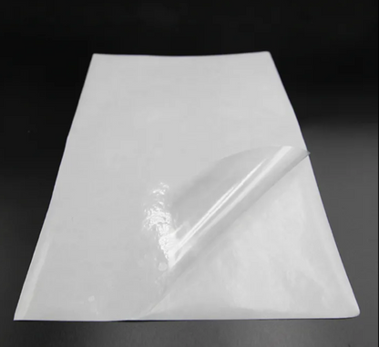 68 microns +/- self adhesive transparent laminating film with paper release